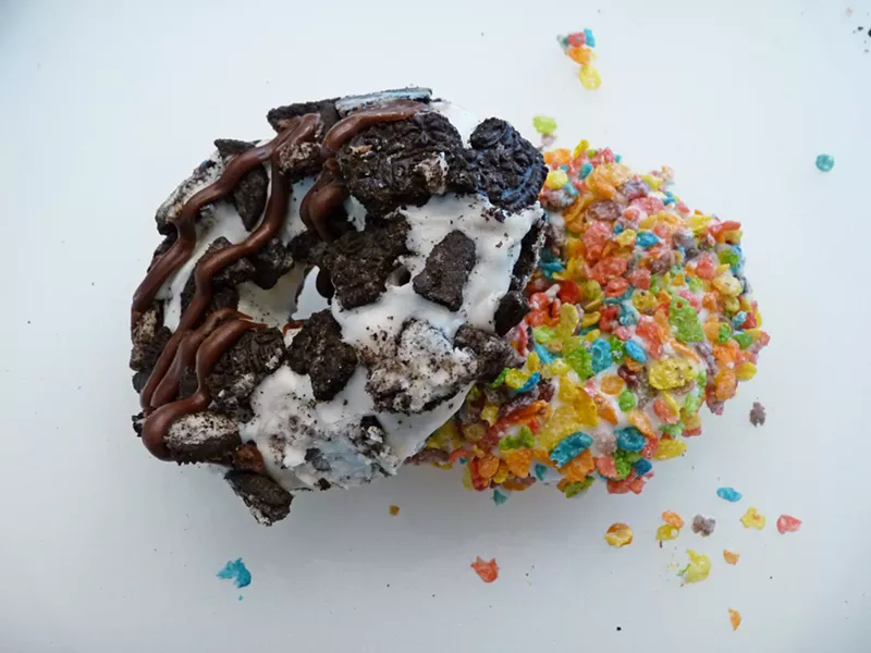 Image: Cookies & Cream and Fred Flintstone are among some of the gourmet doughnuts made at Hurts Donut Company.