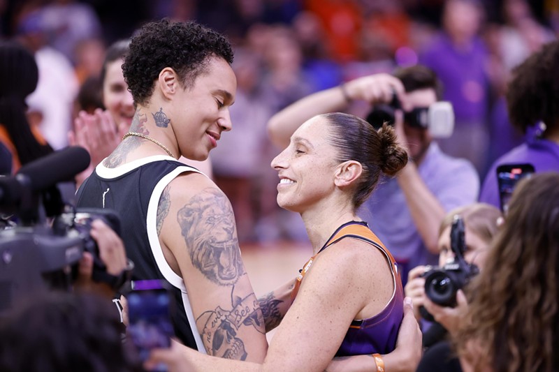 Guard Diana Taurasi (right) of the Phoenix Mercury greets center Brittney Griner (left) after scoring her 10,000th career point during the game against the Atlanta Dream at Footprint Center on Aug. 3.