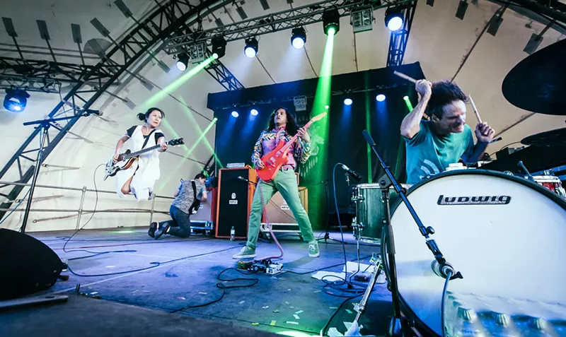 Image: Deerhoof in concert. The band is one of the latest to pull their music off Spotify.