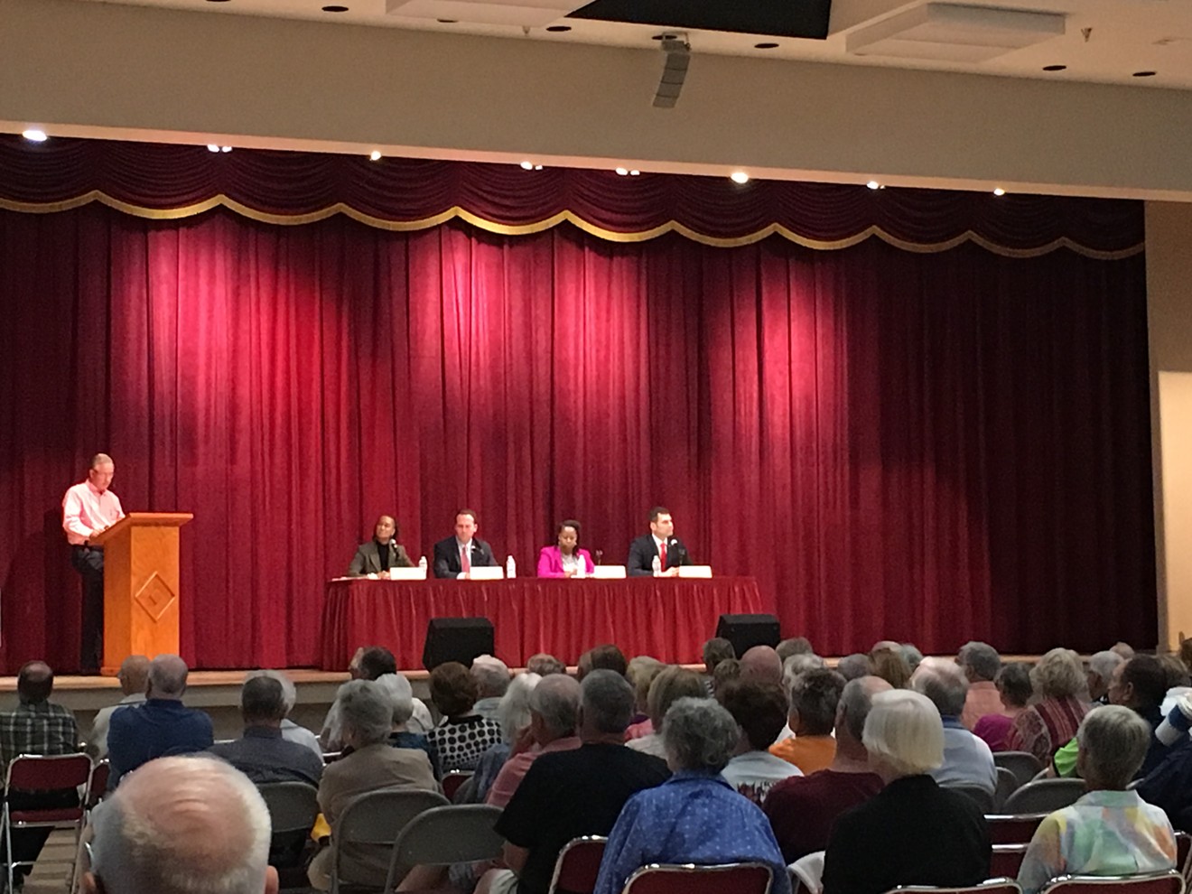 Candidates for the Arizona Corporation Commission trotted out campaign boilerplate material Monday night before an audience of deeply frustrated Sun City residents.