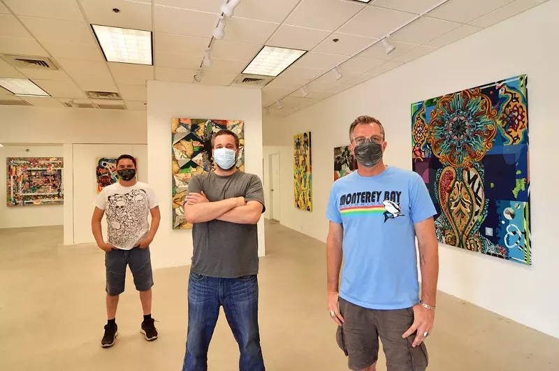 Image: Left to right, Fausto Fernandez, Grant Vetter, and Bill Dambrova work inside Mood Room at Park Central Mall.