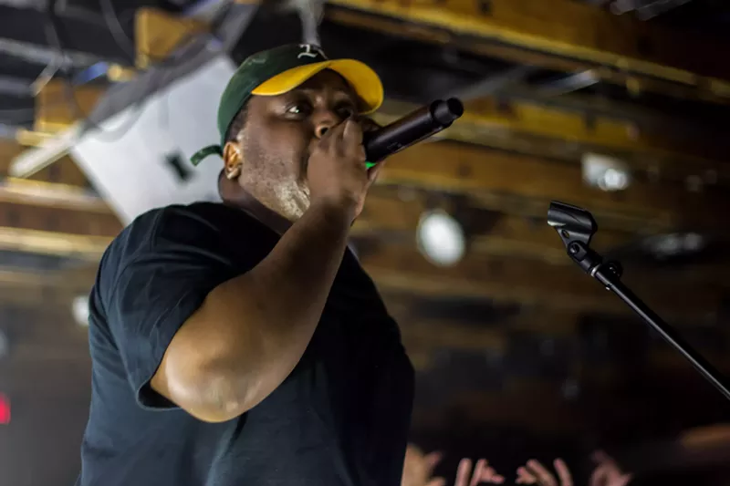 Image: Stepa J. Groggs raps to the crowd.