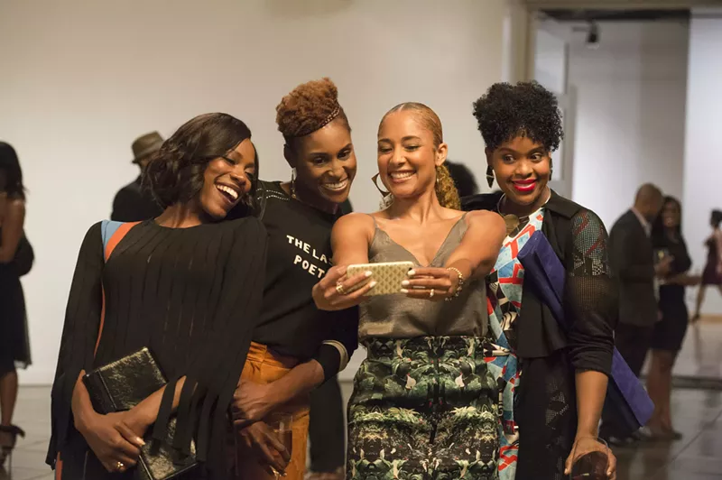 Image: Yvonne Orji, Issa Rae, Amanda Seales, and Natasha Rothwell.