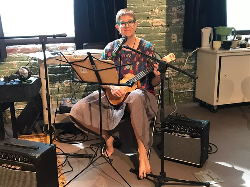 Image: Adriene Jenik sings a song she wrote inside her studio in the Phoenix warehouse district.