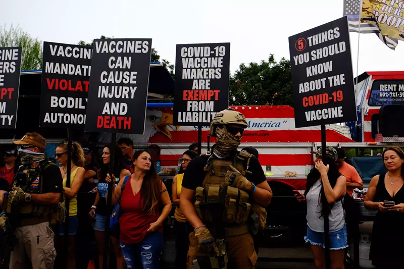 Image: A member of the "Good Citizens" militia at the "Liberty Revolution" rally.