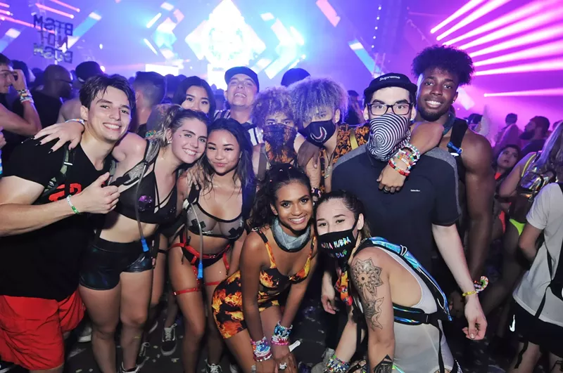 Image: EDM fans at Bassrush Arizona posing with some of their nearest and dearest.