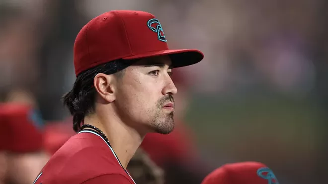 Diamondbacks outfielder Corbin Carroll watches from the dugout during the second inning of a game against the New York Yankees.