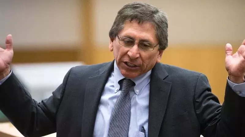 Image: Juan Martinez has been placed on paid leave from his job as deputy county attorney.