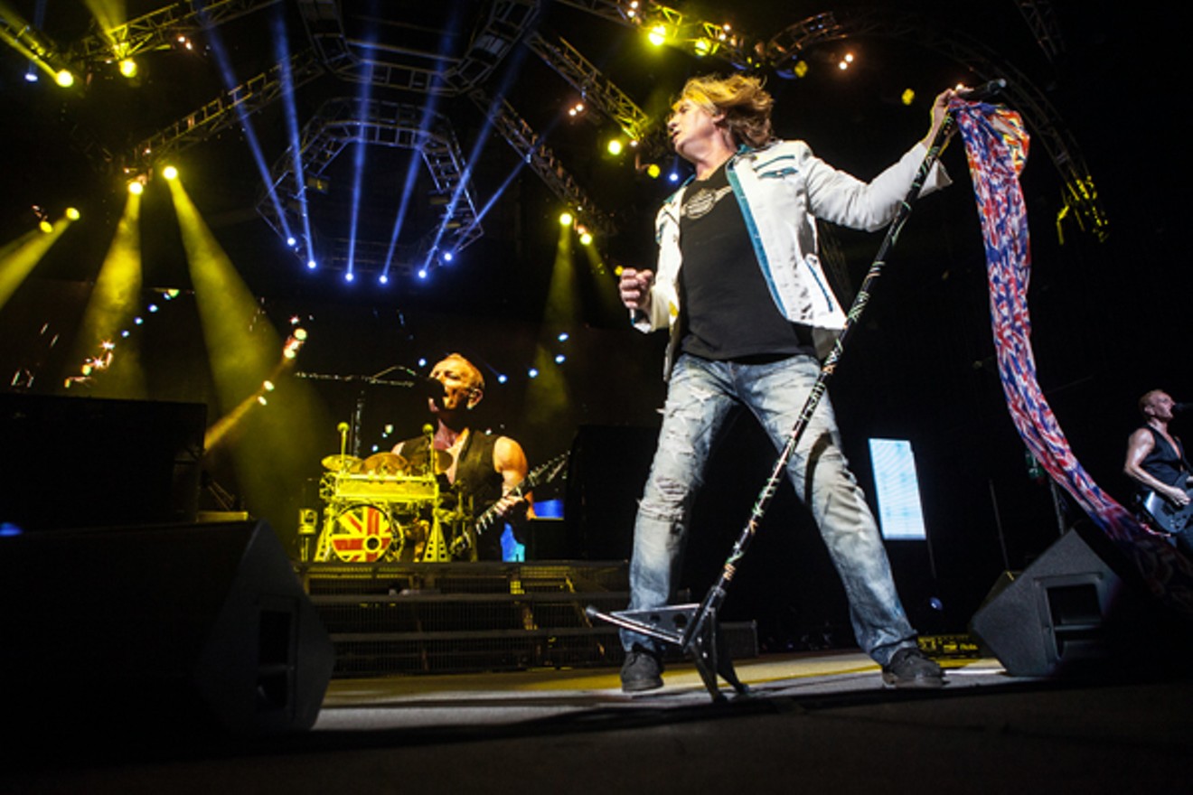 Def Leppard performing at Ak-Chin Pavilion in 2014.