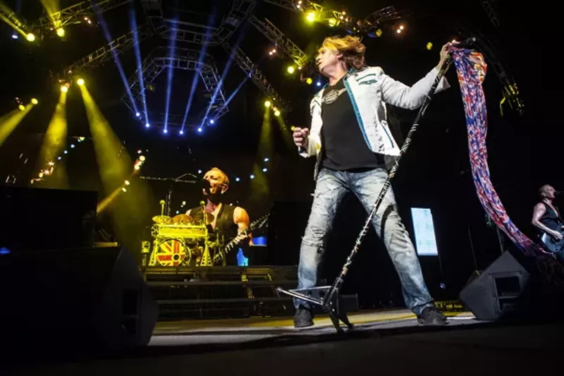 Image: Def Leppard performing at Ak-Chin Pavilion in 2014.