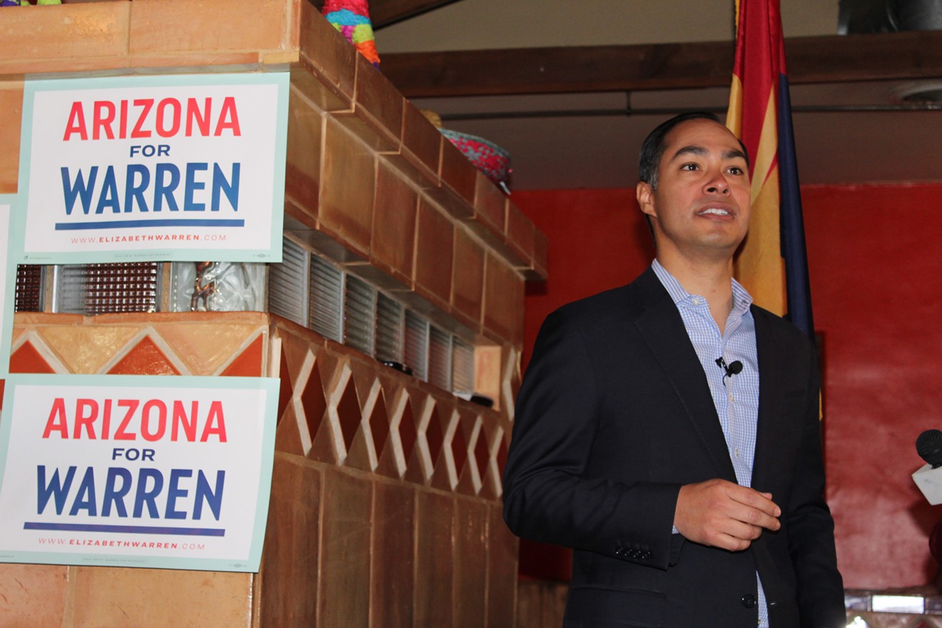 Former presidential candidate Julián Castro campaigns for Senator Elizabeth Warren, whom he endorsed for the nomination in January, at Phoenix's El Portal restaurant on Tuesday.
