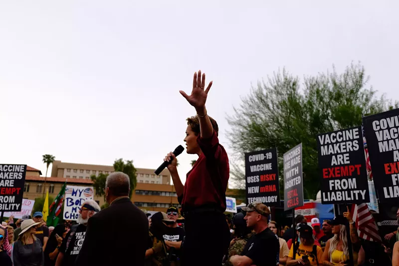 Image: Kari Lake speaks at an anti-vaccine rally in Phoenix.