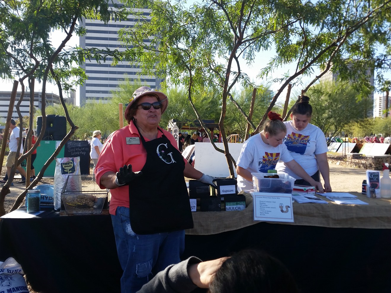 Last October, Keep Phoenix Beautiful launched its series of garden workshops at PHX Renews in midtown Phoenix. Pictured is Gail Latour leading the Wildflower Workshop, one of the classes in that series. Participants learned about soil care and worm farms.