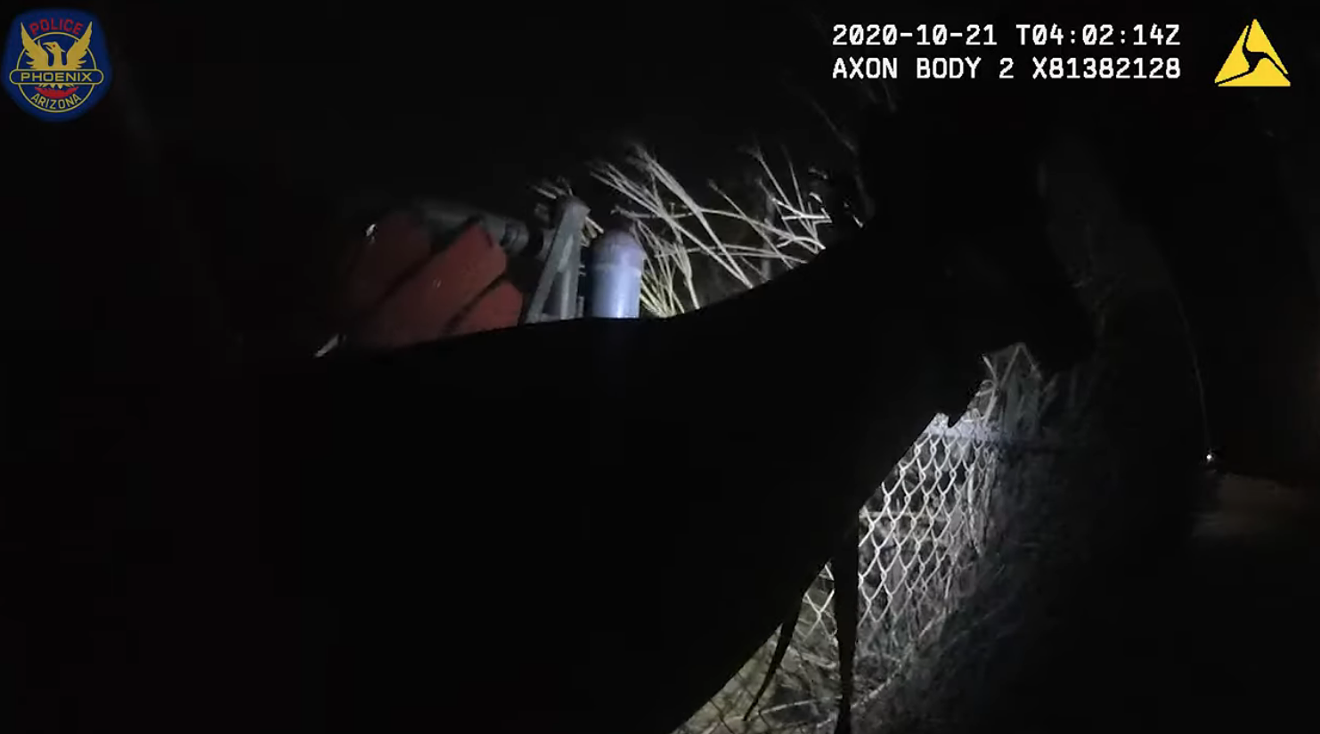 A screenshot from body camera footage depicting the shooting of Emmett and George Cocreham.