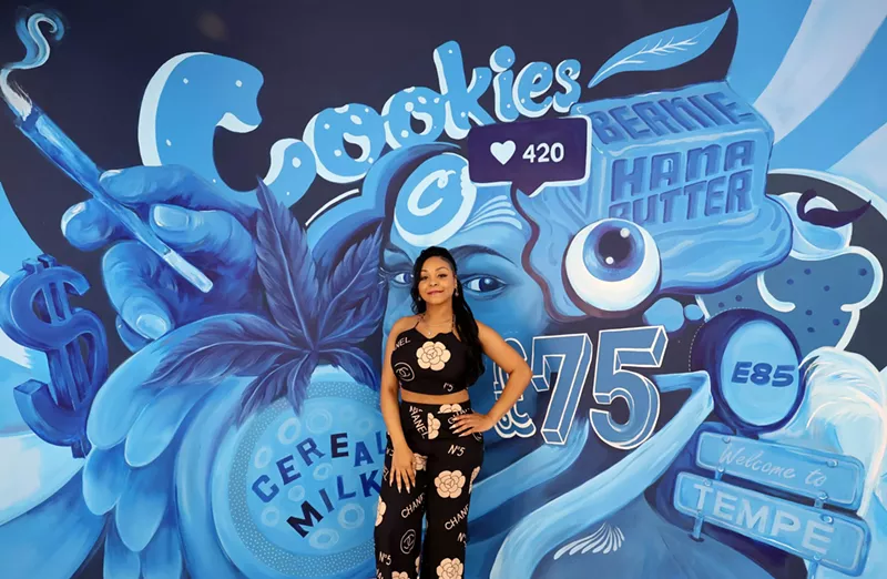 Image: Cookies dispensary owner Alicia Deals poses is one of the only Black women to own and operate a dispensary in Arizona.