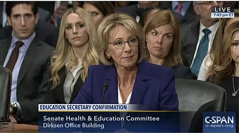 Image: Did Betsy DeVos "pay to play" by donating to Republicans, as one liberal group claims?