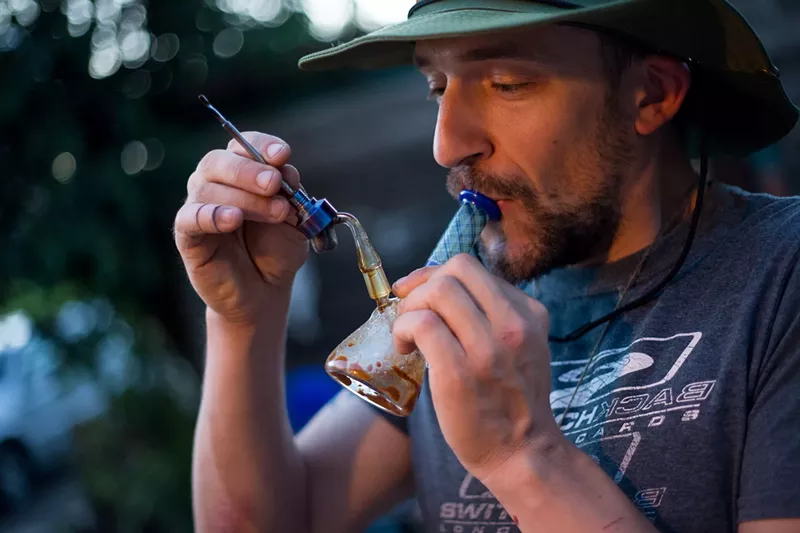 Image: City employees can smoke weed on their off days, but they have less protections than medical users.