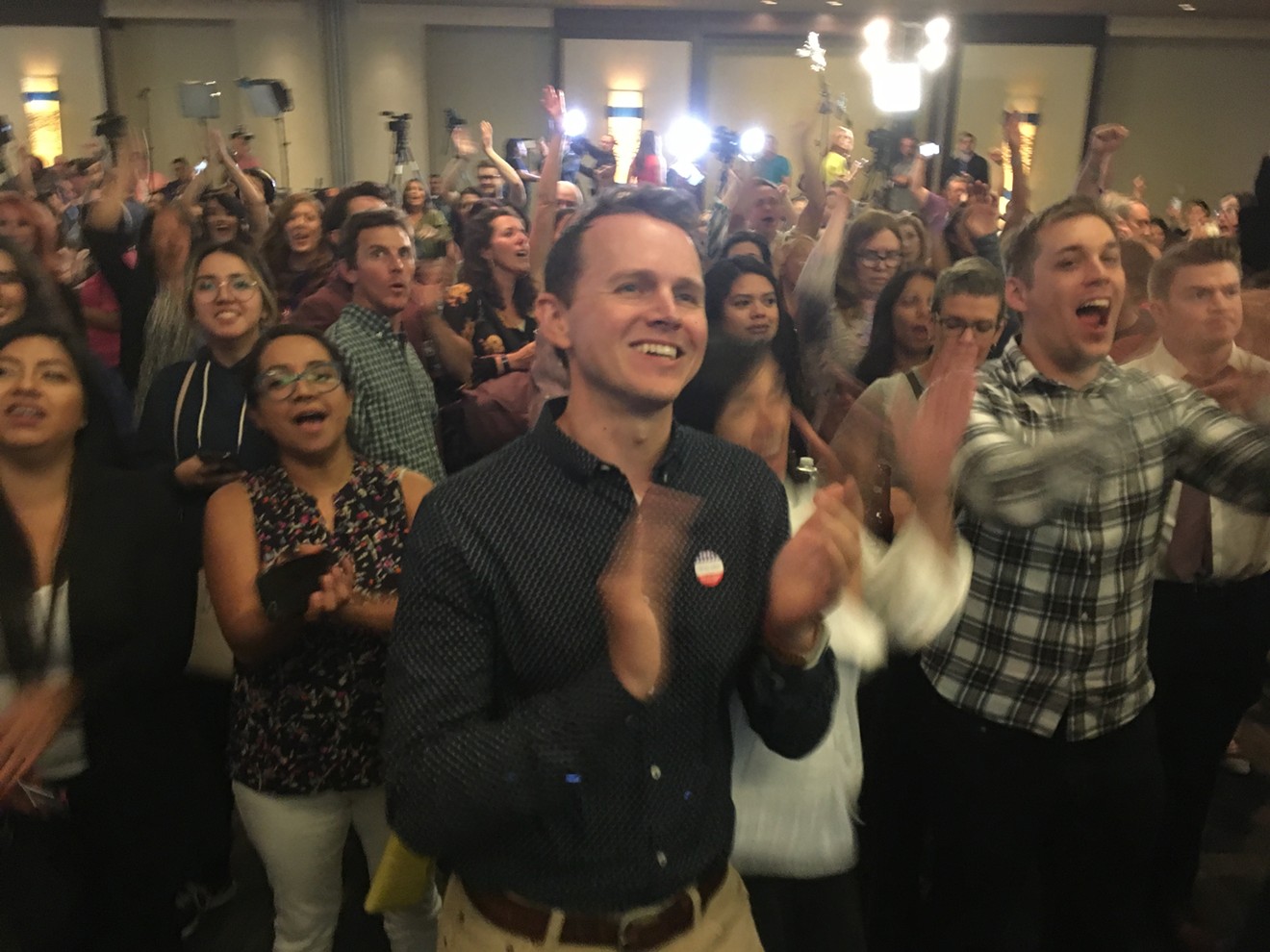 Democrats celebrate Tuesday night at the Renaissance Hotel in downtown Phoenix  when they learn that CNN projected that the party will regain control of the U.S. House.