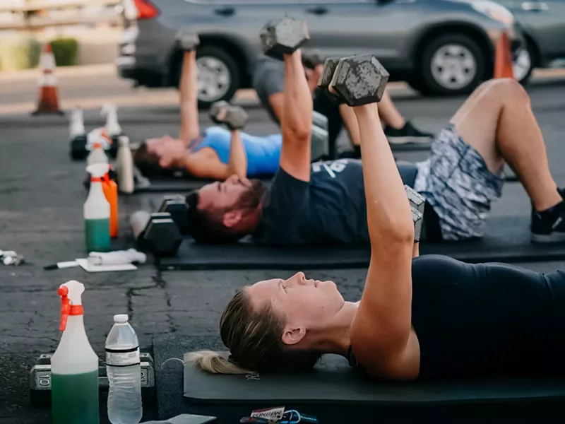Image: Octane CrossFit in Phoenix has been holding work outs in their parking lot. They plan to re-open their main space on Monday.