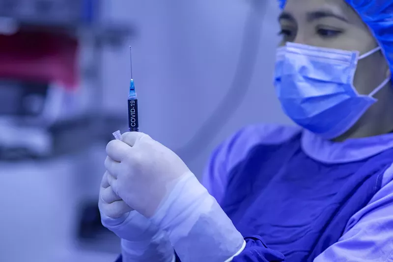 Image: Computer glitches delayed thousands of health care workers from getting their COVID-19 vaccine in Maricopa County.