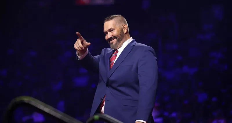 Image: justin heap pointing and smiling