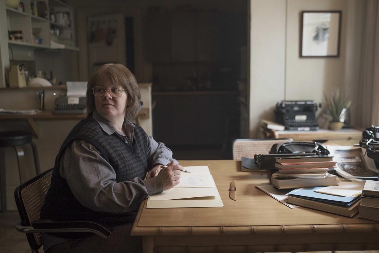 Melissa McCarthy stars as celebrity profiler Lee Israel, a taciturn, seething woman who discovers her genuine skill for fakery, in Marielle Heller’s sympathetic biopic Can You Ever Forgive Me?