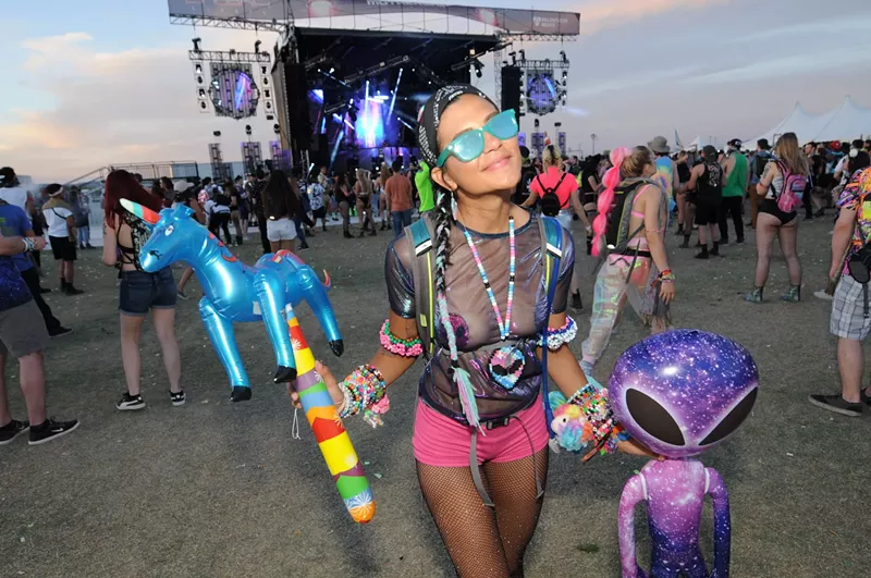 Image: An attendee of the Phoenix Lights music festival in 2019.