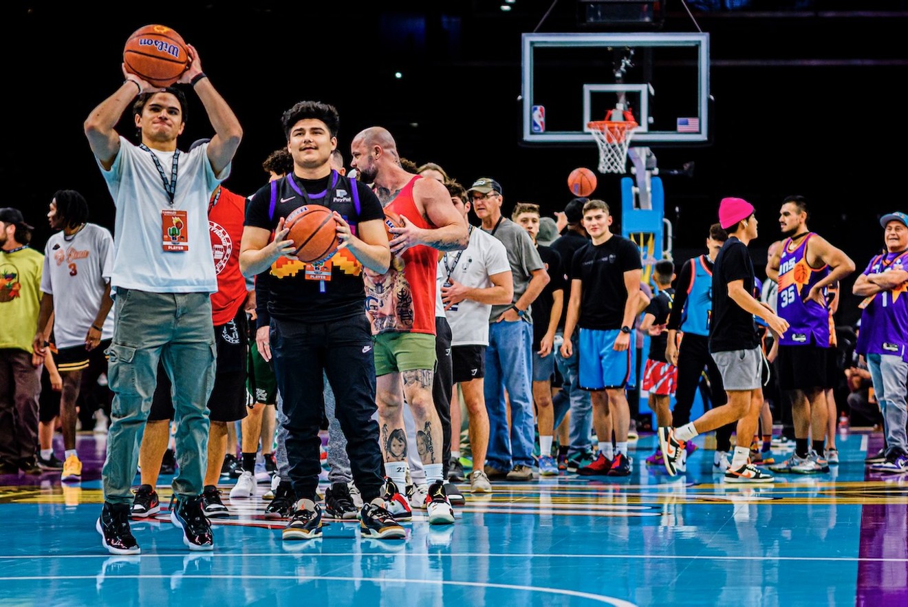 Attendees of Cannabis Cactus NBA Skills & Thrills Experience on Nov. 10 line up for a game of bump out on the court of Footprint Center.