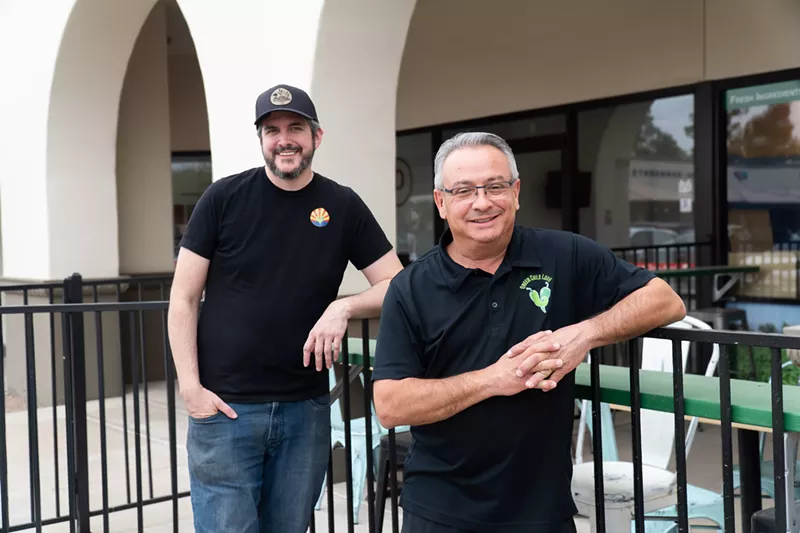 Image: Green Chile Love owner and chef Dave Castaneda (right) poses with cook Leon Eubanks (left) in front of the new Ahwatukee restaurant.