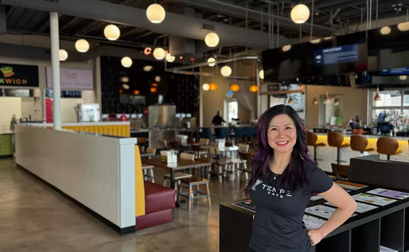 Image: Teresa Nguyen stands in a food hall.