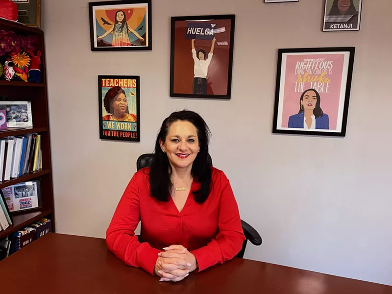 Image: Marisol Garcia sits in her office at AEA headquarters in downtown Phoenix.