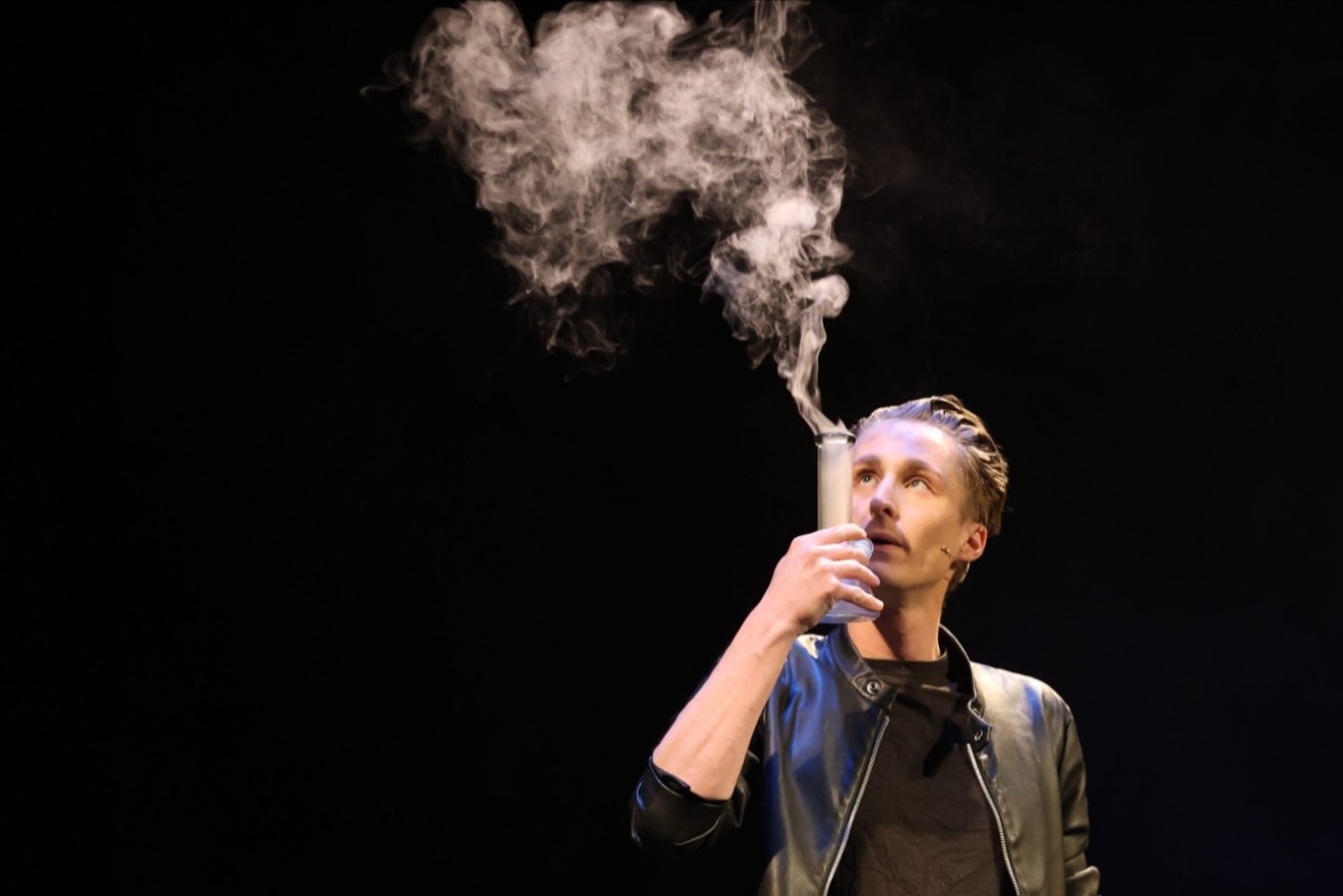 Ben Zabin smokes out of a bong at his cannabis-themed magic show, “Smokus Pocus,” on March 1 at Phoenix Center for the Arts’ Third Street Theater.