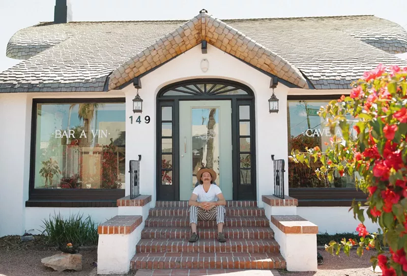 Image: Chef Derek Christensen on the steps of Sauvage Wine Bar.