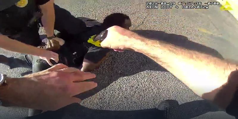 Image: body cam footage of a black man being tasered