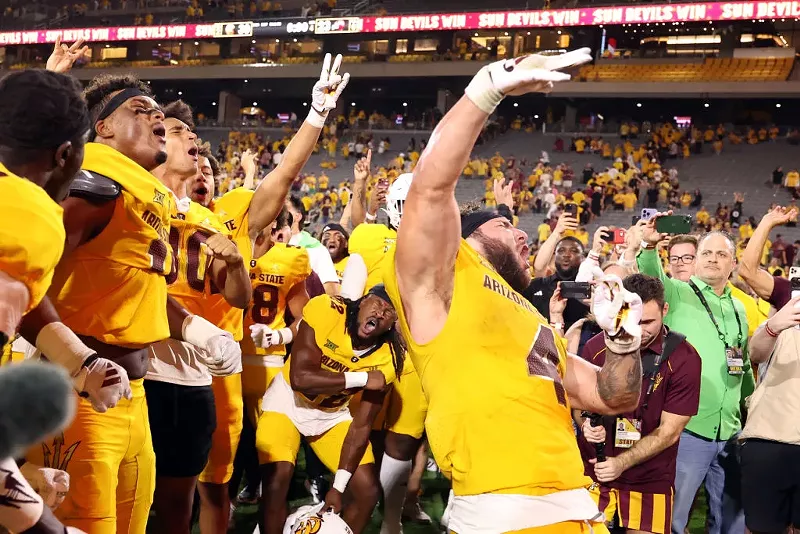 Image: Running back Cam Skattebo of the Arizona State Sun Devils celebrates with teammates after the Sun Devils defeated the Mississippi State Bulldogs on September 7.