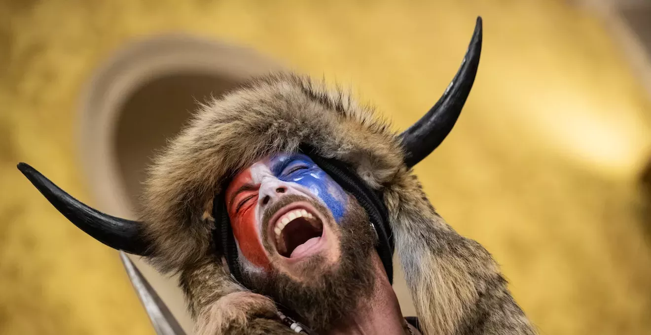 Image: QAnon Shaman says he’s rightful president, sues Trump for $40 trillion