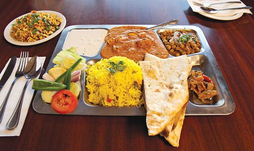 The best way to enjoy many of New India's entres is as a thali dinner, which includes a daily curry and intensely spicy pickles.
