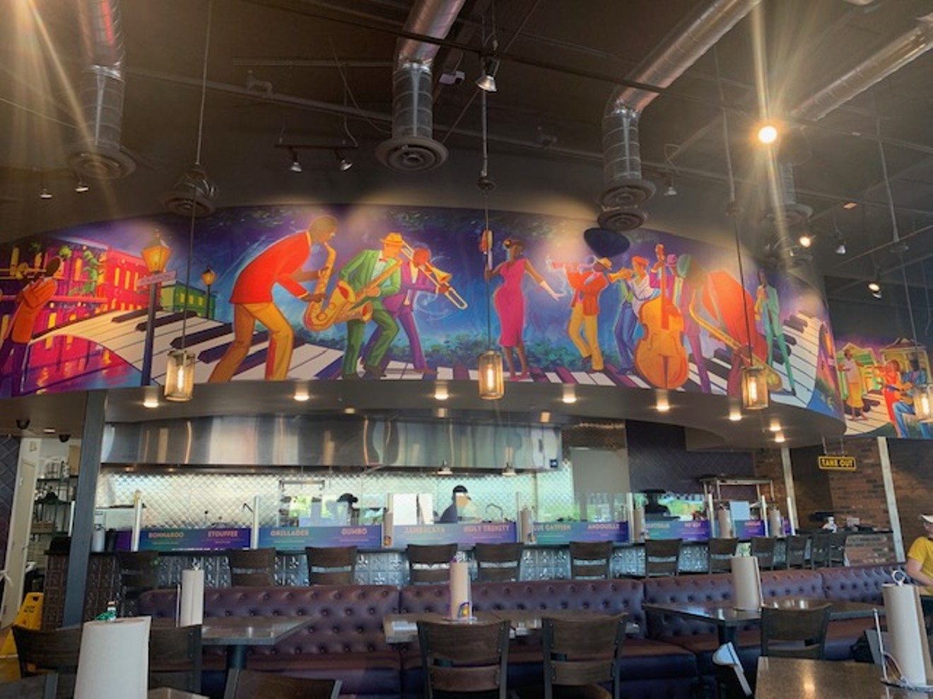 This jazz musician, Southern-themed mural has piano keys running throughout with a special appearance from some cartoon characters.