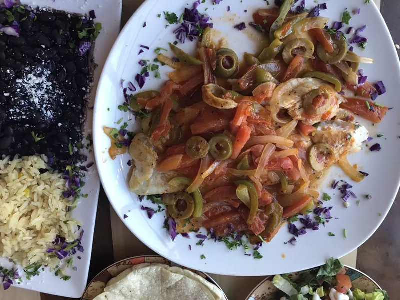 Image: Veracruz-style swai with rice, beans, and more.
