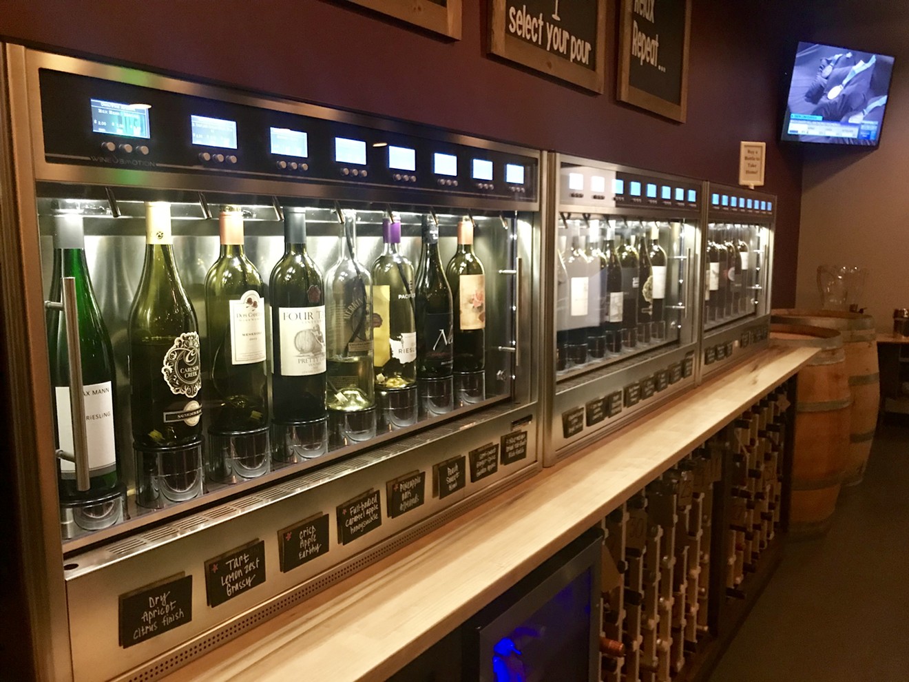 Self-serve wine by the bottle at GenuWine, with lots of local wineries represented.
