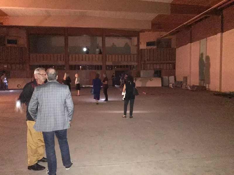 Image: Latino Cultural Center ad hoc committee exploring part of the North Building.