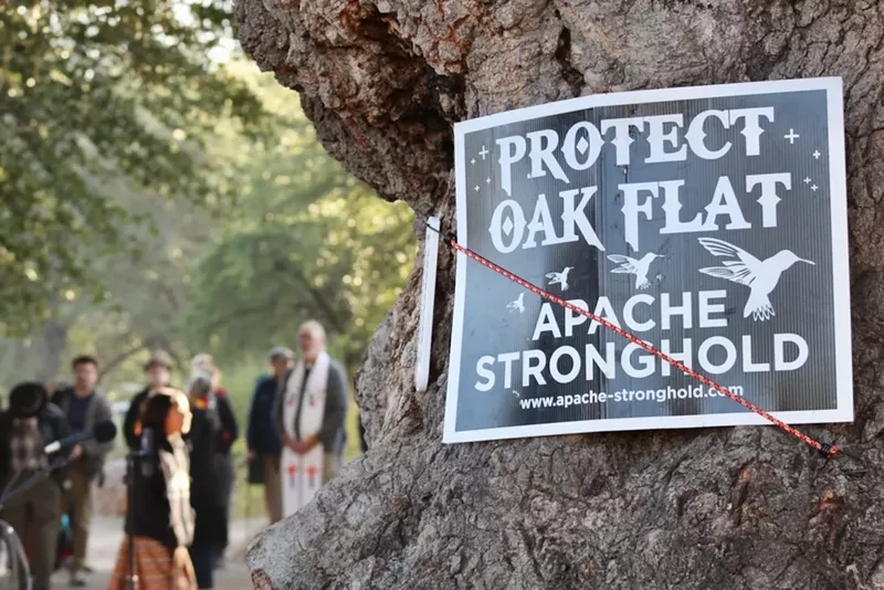 Image: a sign that says "protect oak flat"