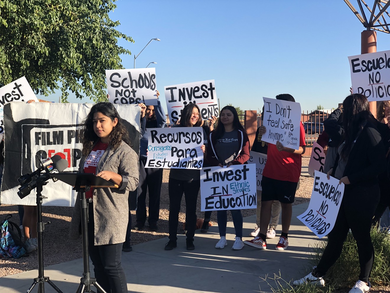 Students protest the use of school resource officers outside Isaac Middle School on October 28.