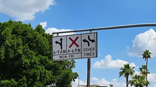 a sign that shows left turns ok during some hours, prohibited during others