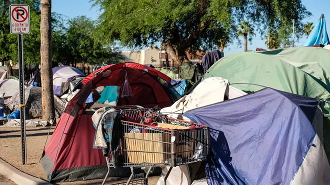A row of tents at a homeless encampment