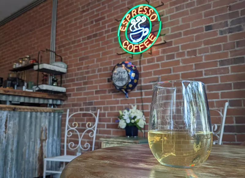 Image: Organic Bean Cafe is cozy, with just a few tables available for seating. Their expansion will add more tables and a dedicated wine bar space.