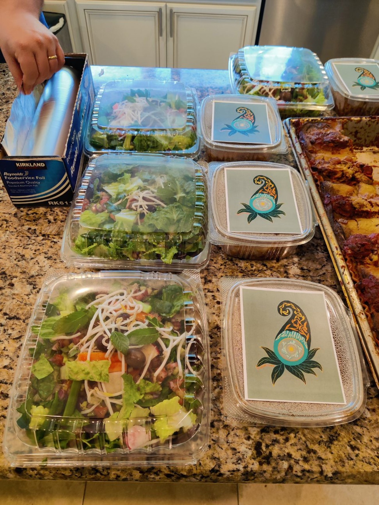 Mediterranean salad and eggplant lasagna boxes ready for pick up and delivery.