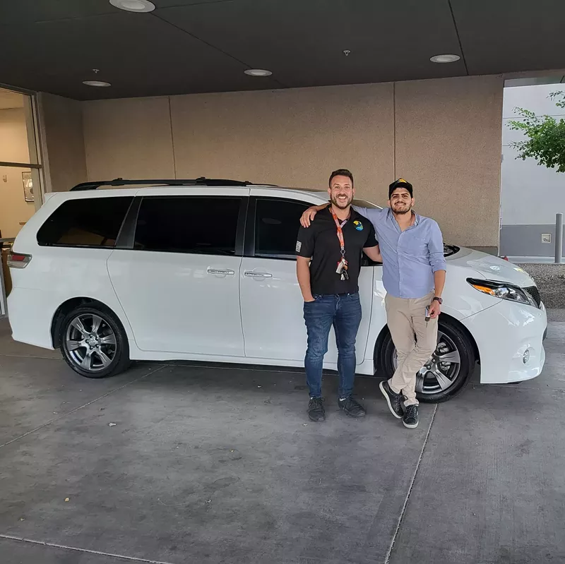 Image: Scottsdale-based Airbnb Superhost Daniel Tocora (left) works with his brother-in-law to grow the family's Arizona vacation rental empire.