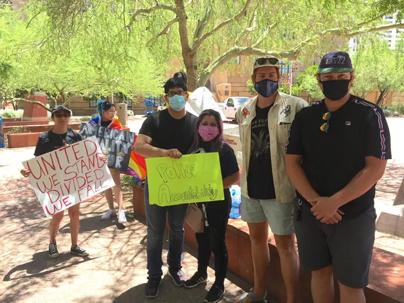 Image: Protesters outside of Phoenix City Council chambers on June 8.