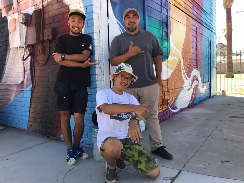 Image: WHOLE9 artists with Thomas "Breeze" Marcus (right) at the Pemberton house.